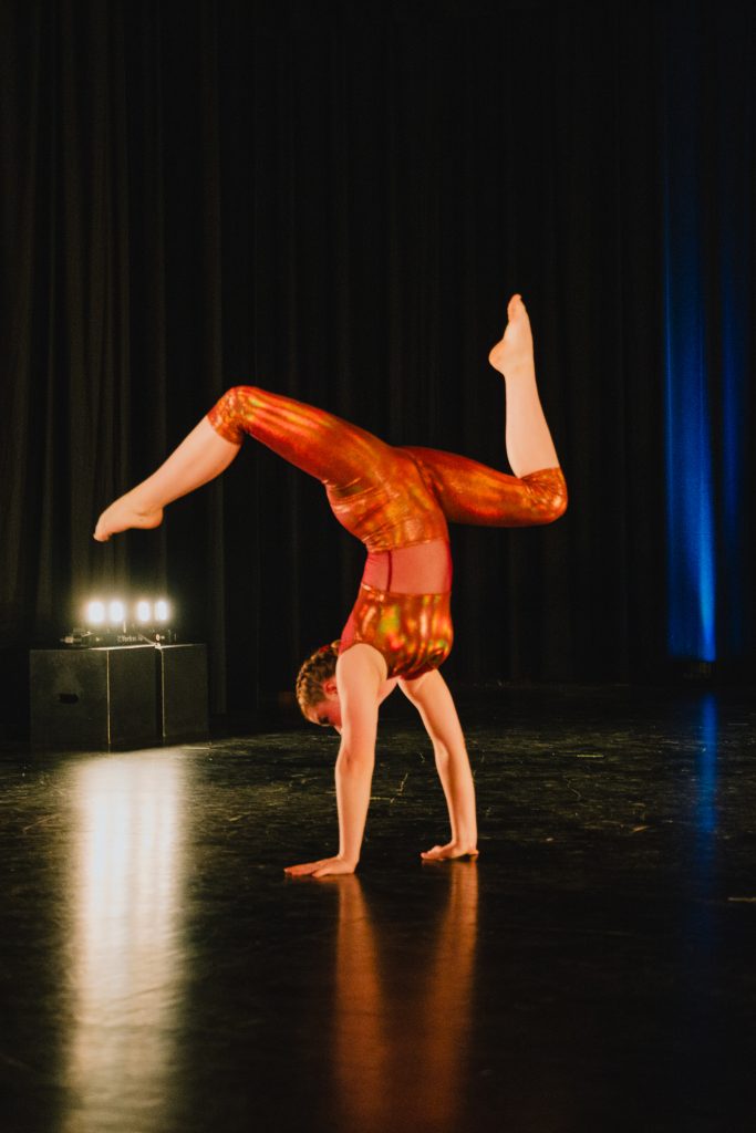 Acrobatic dancer in handstand in Sound in Motion show!